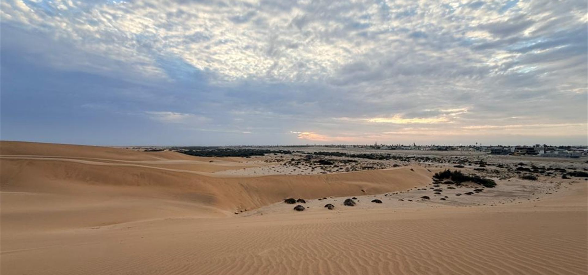 Swakopmund dunes with the town on the horizon